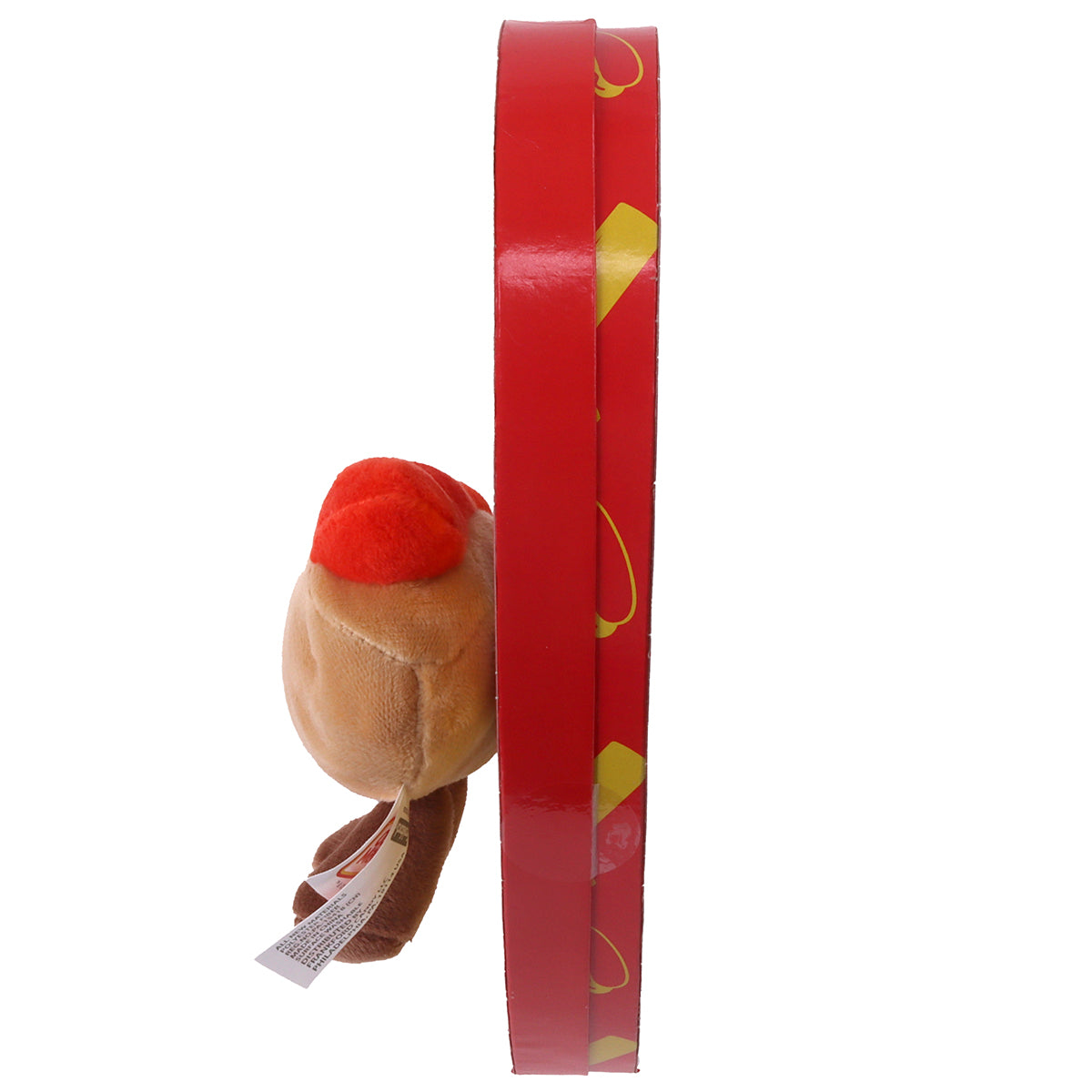 side view of yellow heart shaped box with red border and a hot dog plush on the front