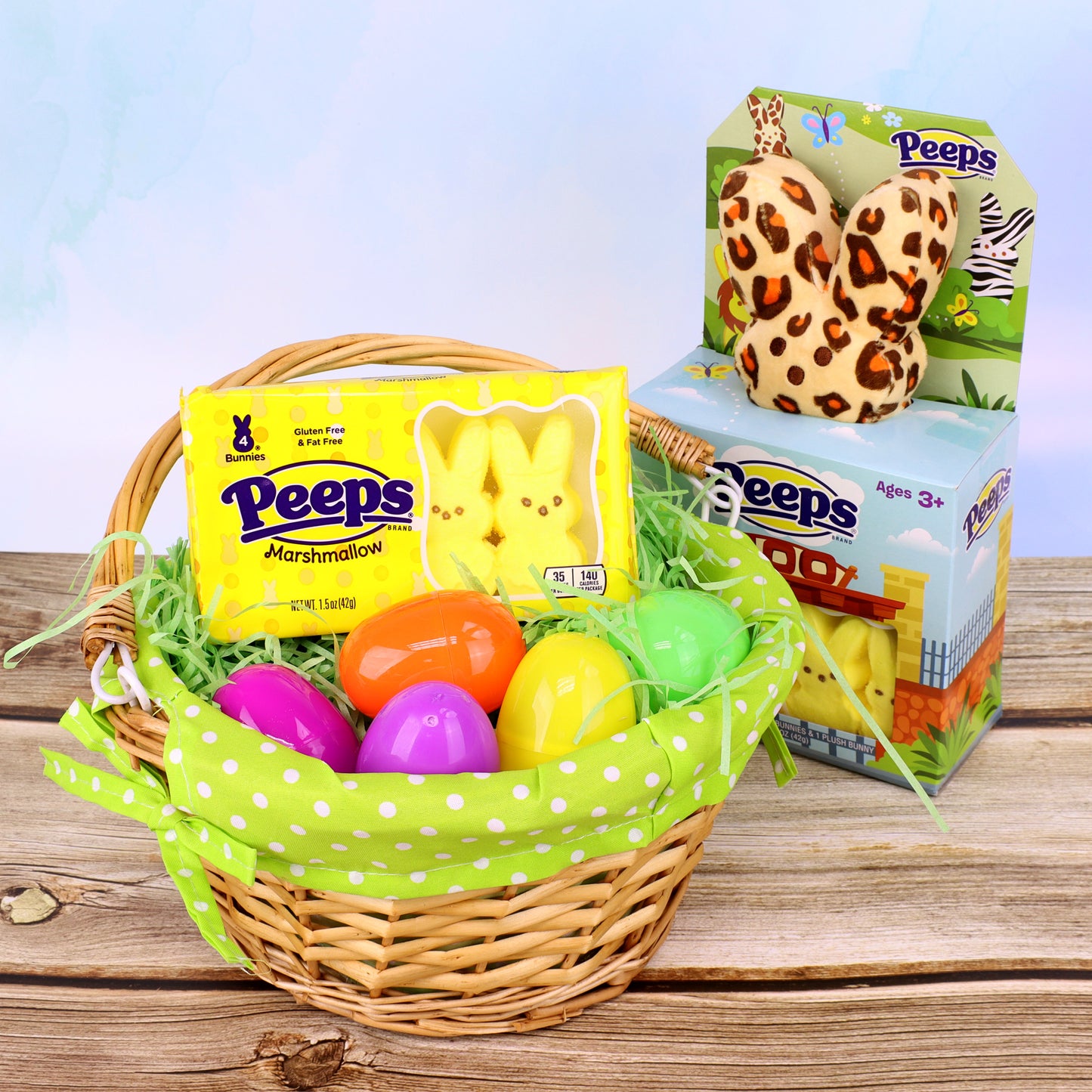 easter basket with plastic eggs and peeps with peeps cheetah set in background