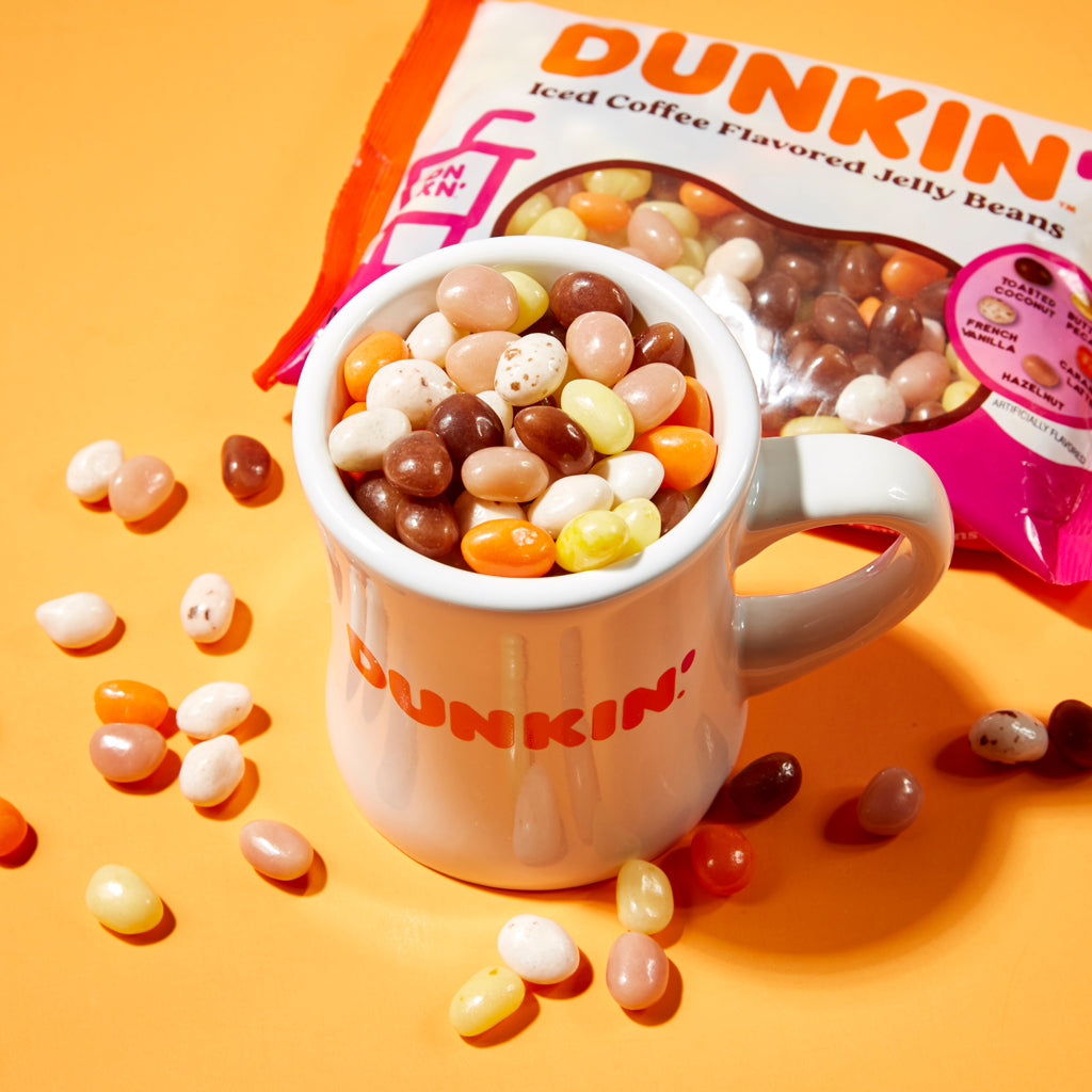 dunkin mug filled with jelly beans