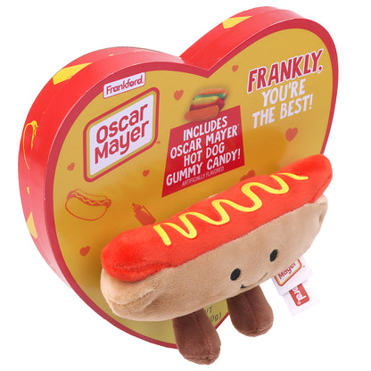 top view of yellow heart shaped box with red border and a hot dog plush on the front