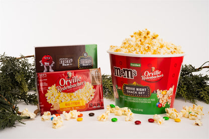 Popcorn bucket and bags with M&M's on a white background