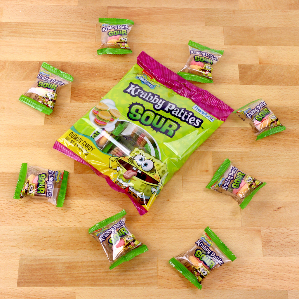 sour krabby patties bag surrounded by individually wrapped sour krabby patties