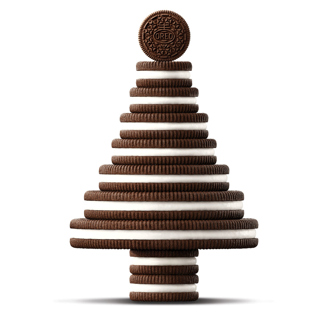 Stack of Oreo cookies arranged in a pyramid shape on a white background