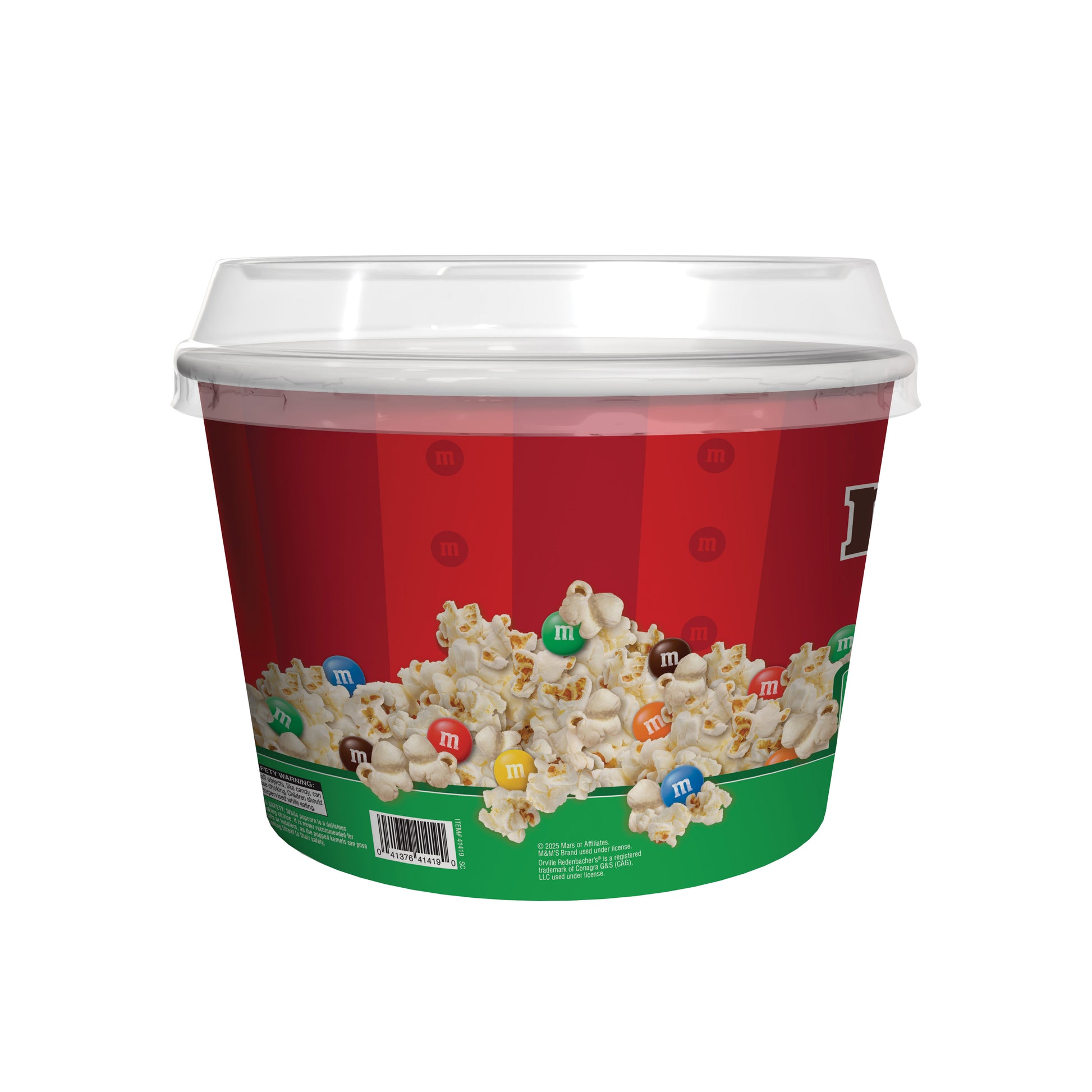 Red bucket with popcorn and M&M's on a white background