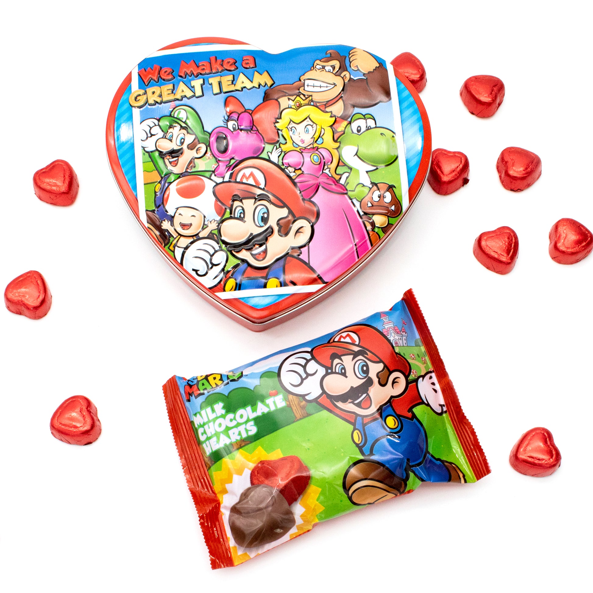 heart shaped box with mario characters and red foiled wrapped heart shaped chocolates and super mario bag
