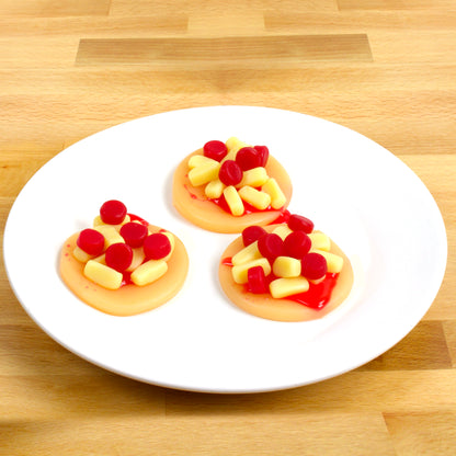 Plate of 3 round gummy pizzas