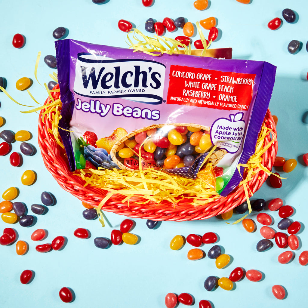 purple bag in straw basket with colorful jelly beans