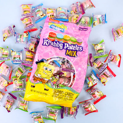 pink and yellow bag filled with colorful krabby patties with krabby patties in the background