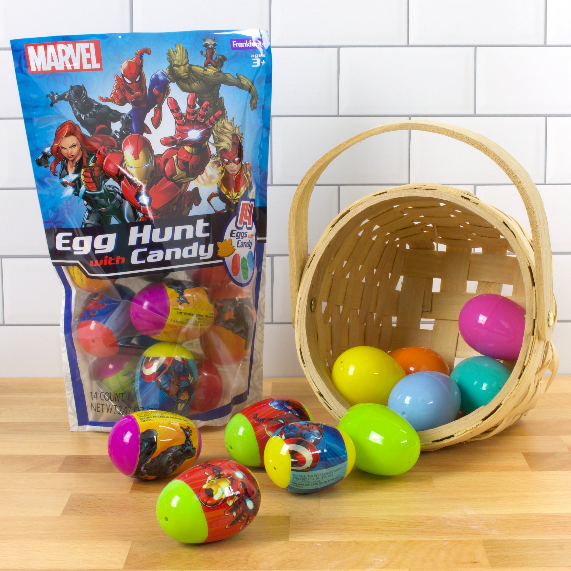blue bag with marvel characters and colorful plastic eggs with straw basket and plastic eggs