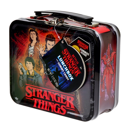 Stranger Things lunchbox with character images and candy label on a white background