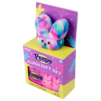 purple and yellow box with a tie dye plush bunny and pink peeps marshmallows