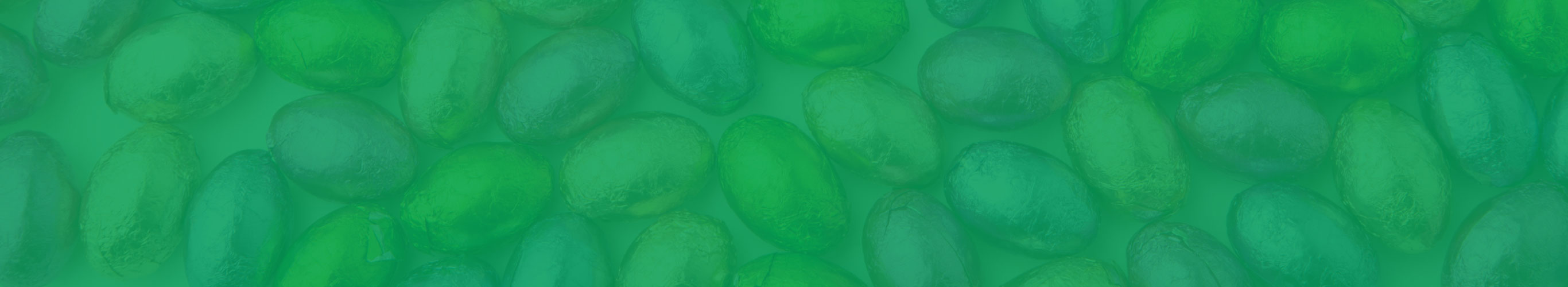 background image of mini chocolate eggs with green overlay