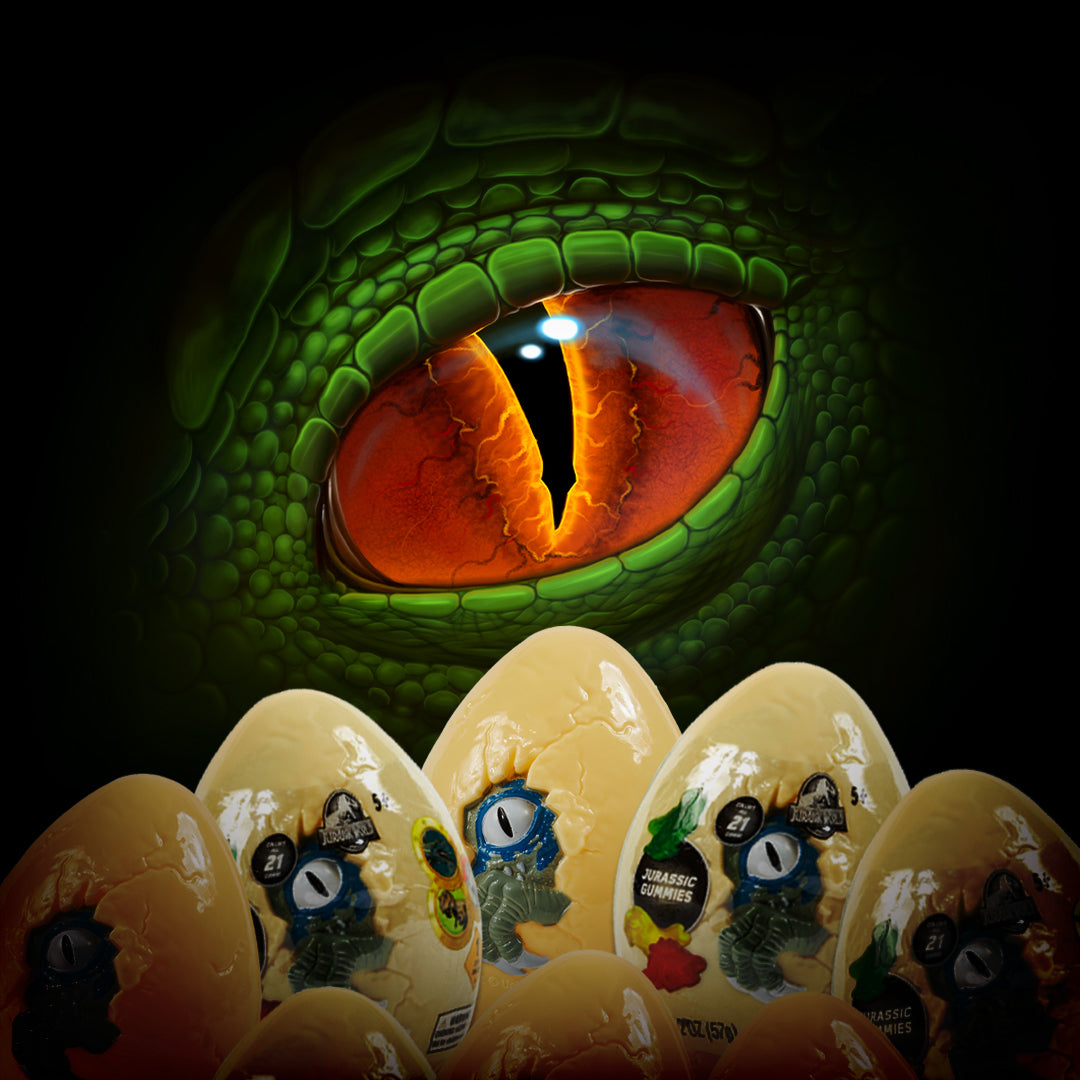 green and orange dinosaur eye with multiple yellow plastic eggs