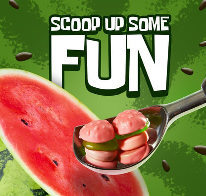 pink krabby patty patties gunnies in a spoon with a watermelon background