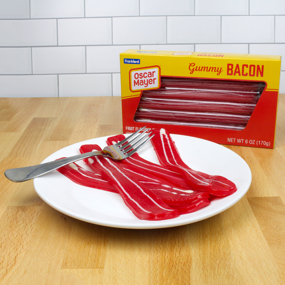 yellow and red box with plate of gummy bacon strips