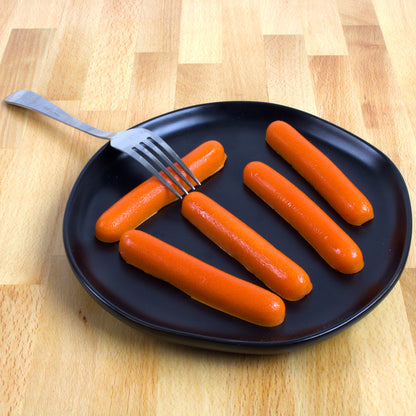 plate of 5 brown gummy hot dogs