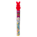 clear tube with multi colored hard candies and topped with pink bunny