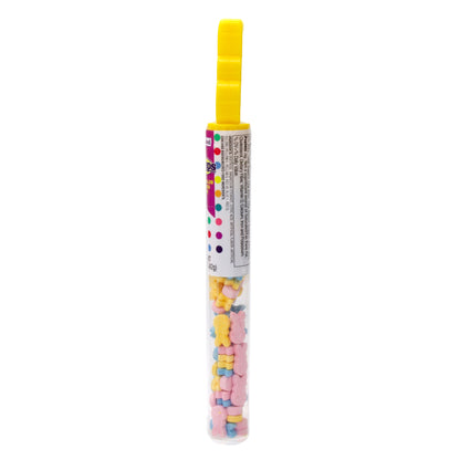 side of clear tube with multi colored hard candies topped with yellow bunny