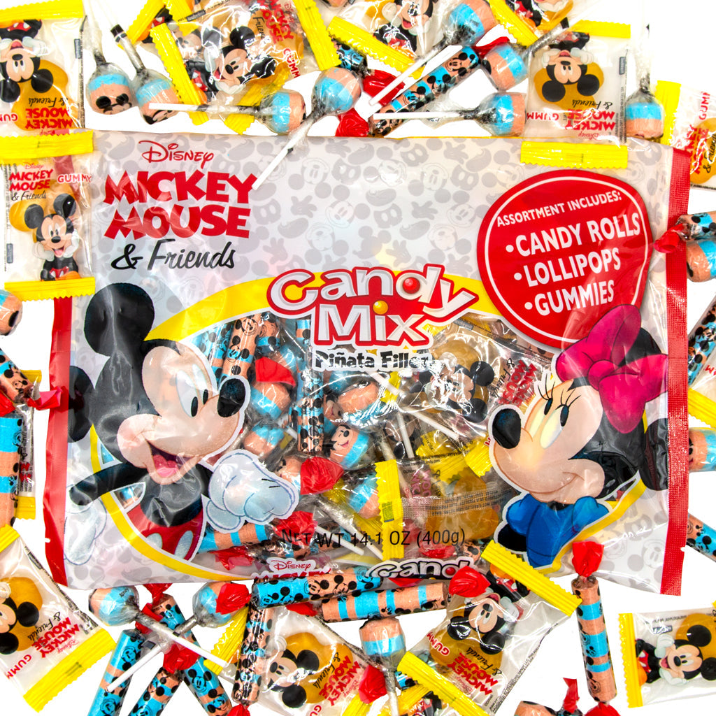 Silver and red candy bag surrounded by individually wrapped candies 